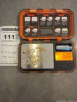 All items on scale showing 6.07 g total weight