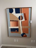 Full view of framed abstract painting