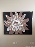 Frontal view of framed Lee Reynolds floral abstract painting