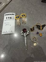 All six jewelry pieces laid out