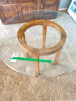 Full table showing glass top and wood base
