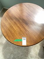 top view of the round walnut finish table