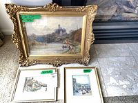 Front view showing all three framed artworks