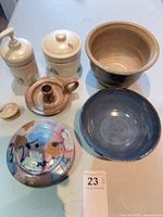Group shot of all eight stoneware items