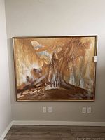 Full view of framed abstract painting on wall