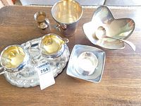 All nine pieces displayed on table