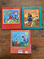 Front covers of both books plus back cover shown