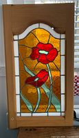 Full view of cupboard door with stained glass insert