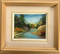 Full view of framed oil painting