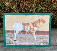 Front view of distressed acrylic pony painting on wood