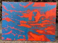 Front view of abstract red and blue painting on canvas