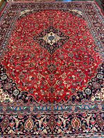 Full view of entire rug showing design and borders