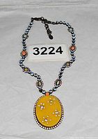 Full view of necklace with pendant and chain