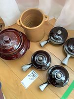 Bean pot, wine cooler, three onion soup bowls visible