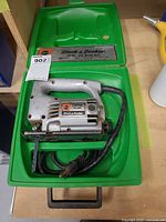 Jig saw in open green carrying case