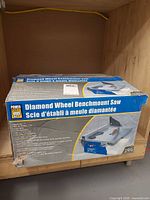 Full view of boxed benchmount saw