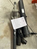 Complete tool with tubes, bag and manual on floor
