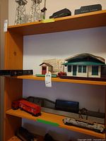 Shelf view with coal tenders, signal towers and lower shelf rolling stock