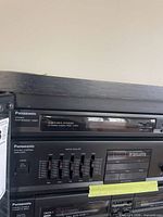 Front of Panasonic SA-H82 showing tuner and equalizer sections