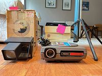 Keystone projector, Argus projector, Kodak Carousel projector box and tray