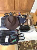 Group shot of all handbags and hats