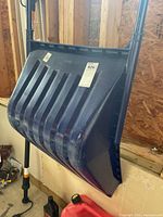 Front view of blue ribbed snow shovel scoop