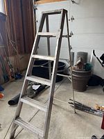 Full view of aluminum step ladder unfolded