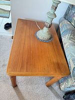 Top view showing teak veneer surface and finish
