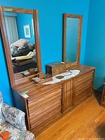 Front view of dresser with both mirrors attached, shows finish and style