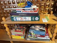 Shelf with Scrabble box, peg solitaire board, upper puzzle and accessories