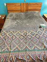 Queen bed with Kingsdown mattress and oak-look headboard