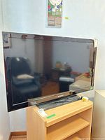 Samsung 40-inch TV on stand