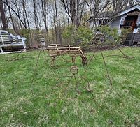Front view of two large angels, one small angel, and reindeer on lawn