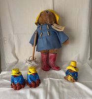 Full view of plush bear with accessories, two bookends and jar