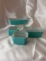 Full set of turquoise Pyrex refrigerator dishes with lids