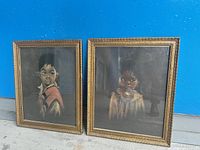 Both framed prints side by side showing scale, frames, and subjects