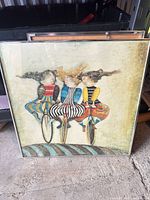 Full view of framed artwork showing image and frame
