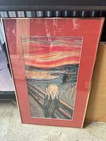 Framed print of Edvard Munch’s The Scream, showing mat and frame
