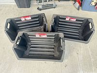 Three Husky bins top view showing internal ribs and handles