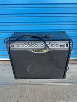 Front view showing Line 6 logo, control panel and grille