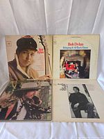 Front covers of all four Bob Dylan Columbia LPs