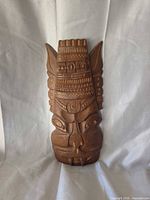 Front view of carved Tiki mask