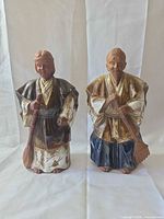 Front view of both figurines