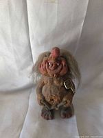 Front view of NyForm troll figurine