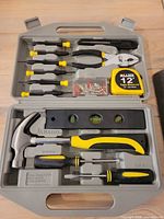 Open case showing all included tools neatly seated