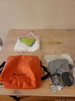All items: sealed gas mask, carrying bag, dosimeter, accessory pack