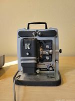 Front view of Keystone K-101Z projector powered cord visible