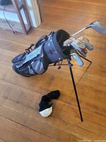 Bag on stand with clubs visible