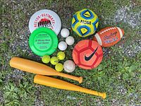 Group shot of all sports items on ground