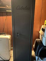 Front view closed cabinet with logo and key in lock